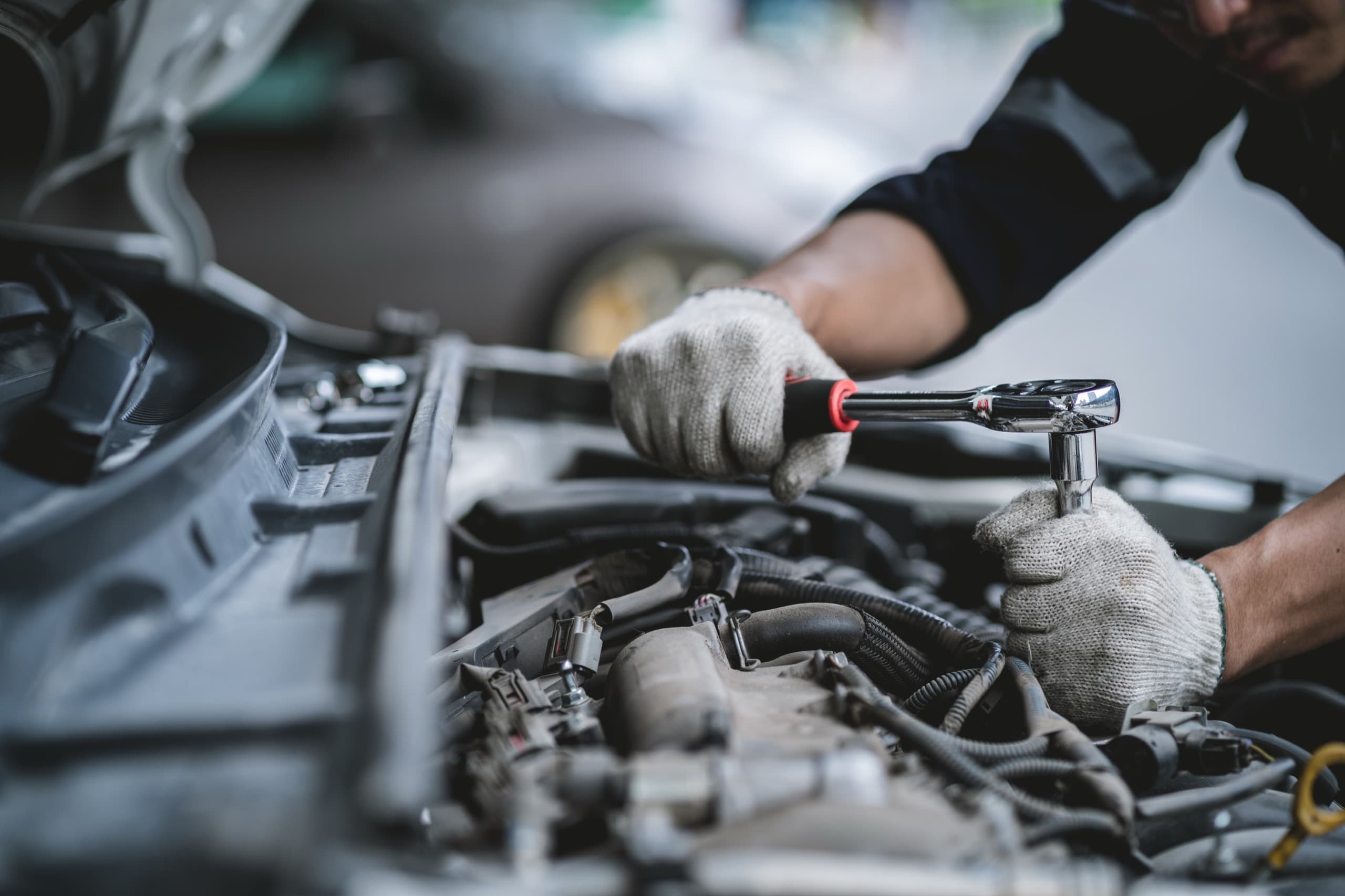 SWM Autos workshop — professional mechanics at work